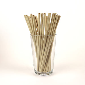 Unwrapped True Kraft Paper Straws in a Glass